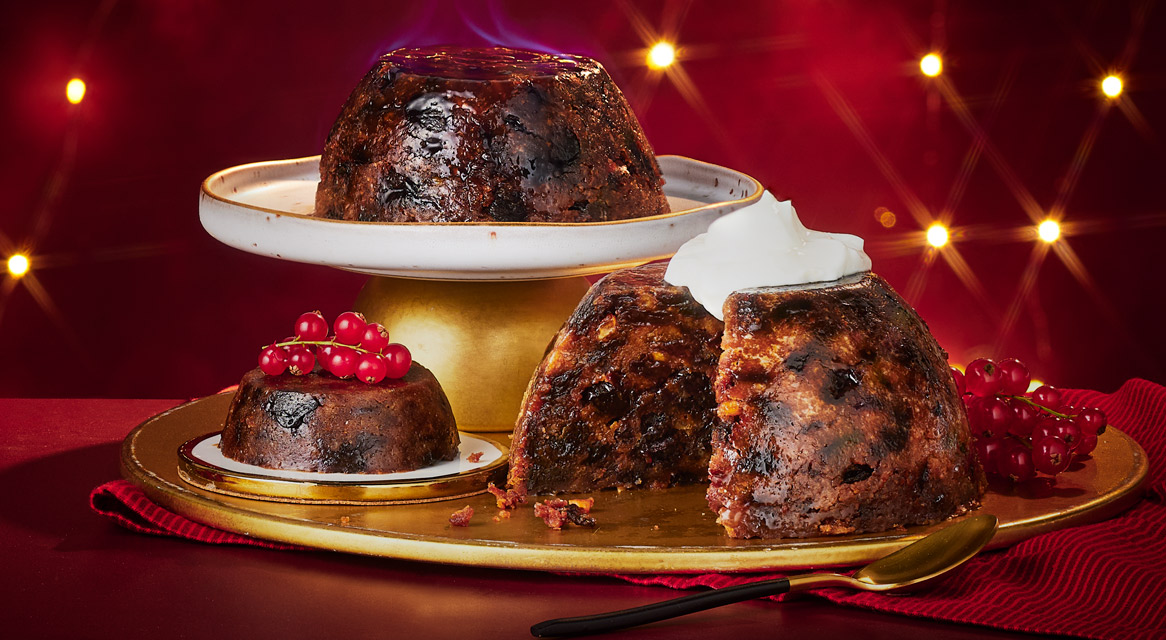 Christmas pudding on a gold platter.