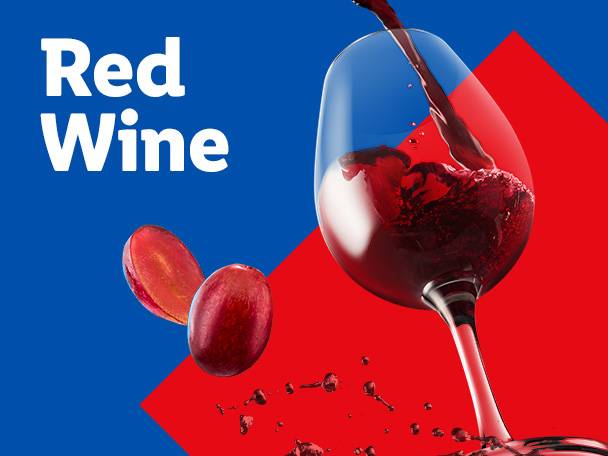 Red wine being poured into a glass, with grapes and a red and blue background.
