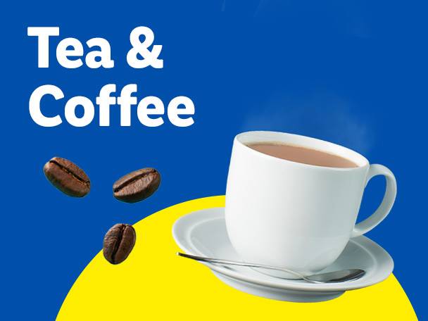 A white mug of hot coffee or tea with coffee beans on a blue and yellow background.
