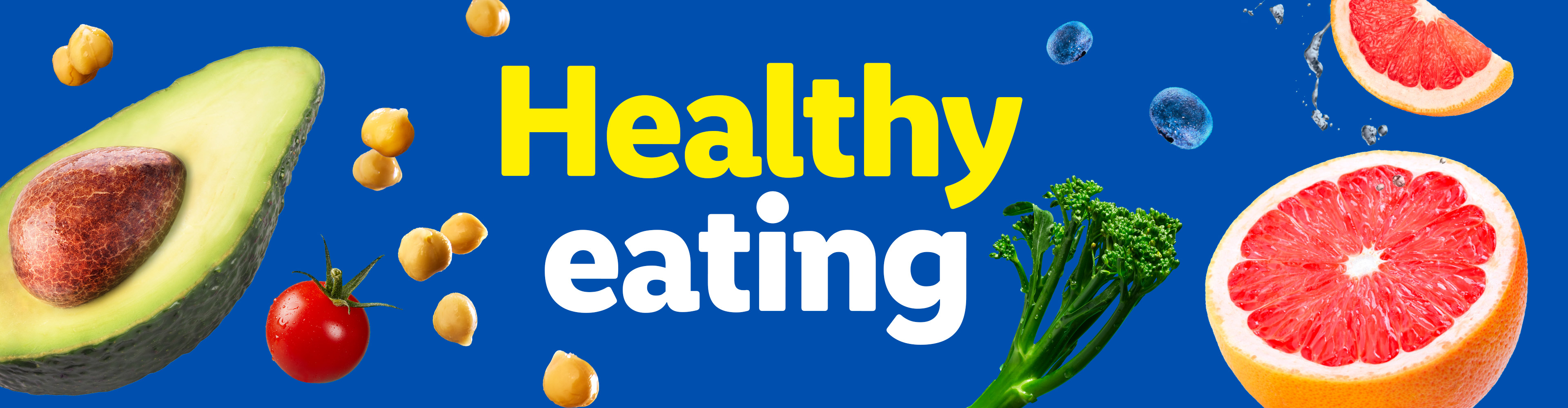 Healthy eating: avocado, grapefruit, chickpeas, tomato, broccoli, blueberries on blue background.