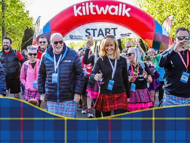 Kiltwalk: people in kilts at a charity walk.